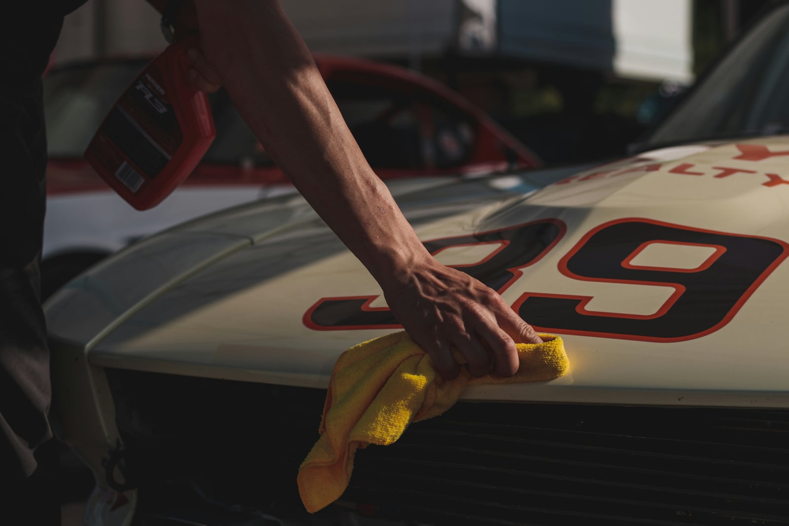 Mobile detailer cleaning a car interior
