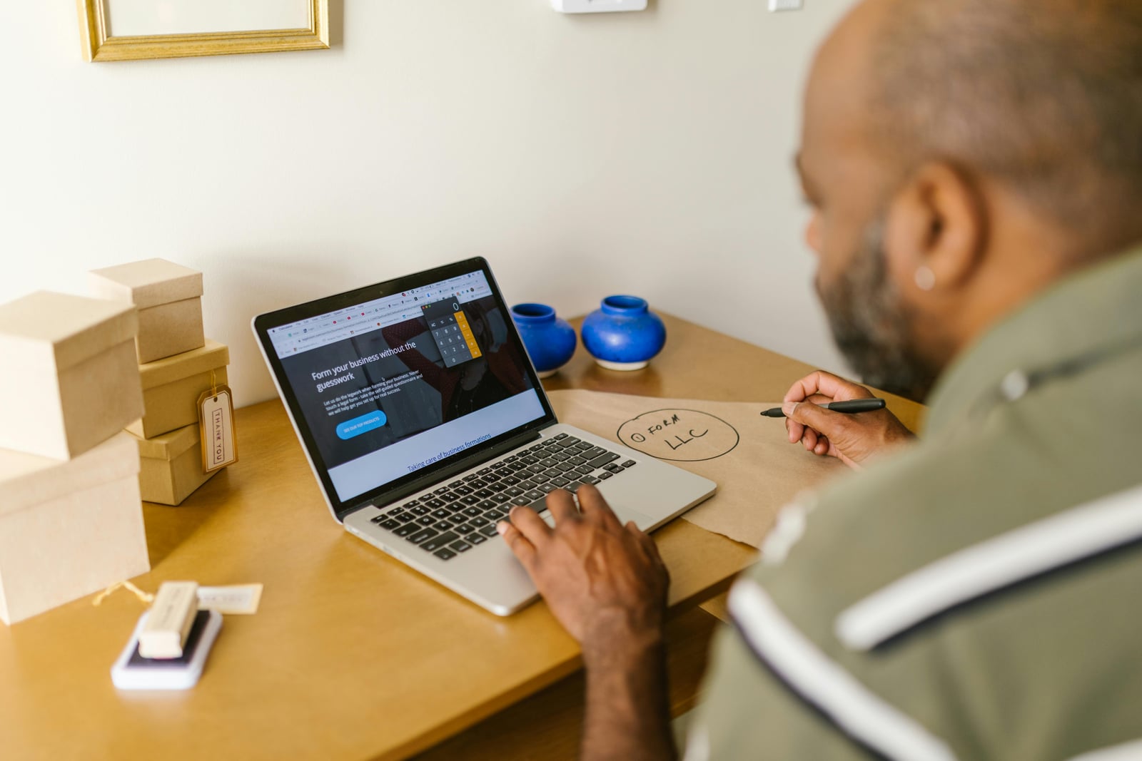 Service business owner planning work at a desk